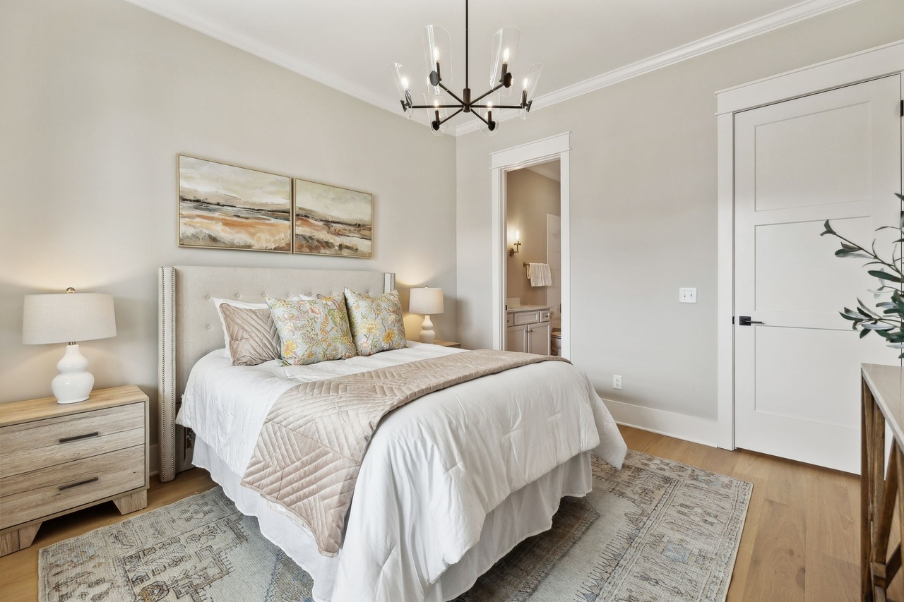Defatta custom home in Murfreesburo bedroom with off white walls
